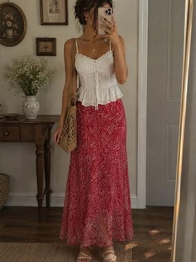 Red floral midi skirt with a soft flowy fit and stretchy waistband